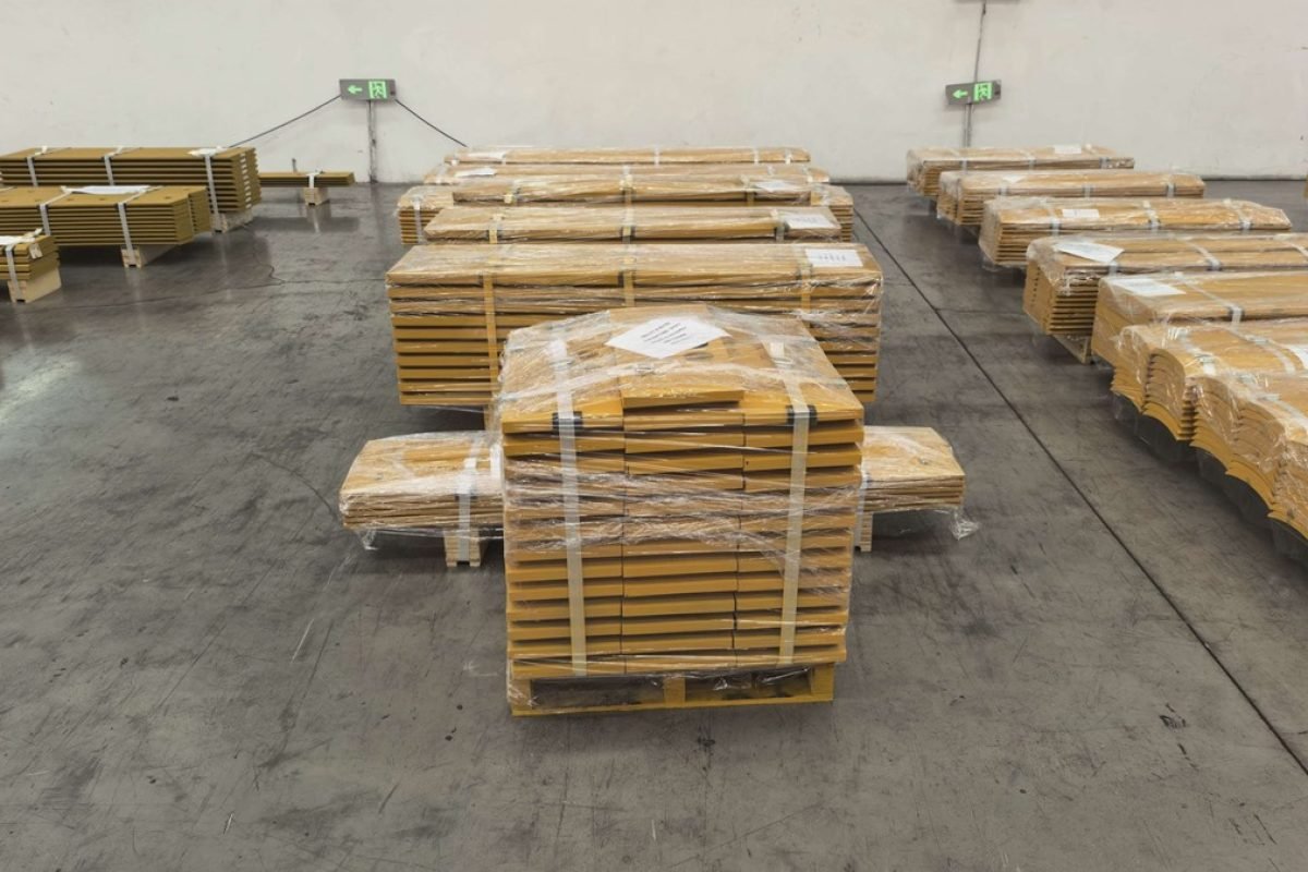 Palletized metal parts prepared for automated handling